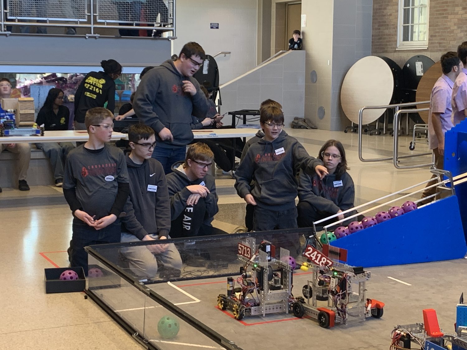 Drive team lined up at the field with controllers